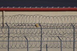 10 arrested in connection with Texas detention center shooting that was ‘planned ambush,’ U.S. attorney says – PBS