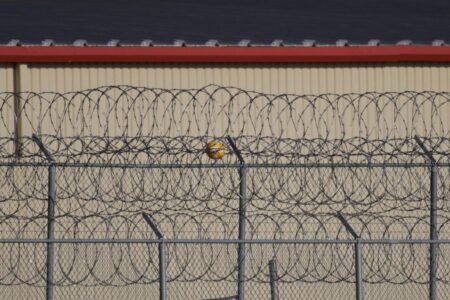 10 arrested in connection with Texas detention center shooting that was ‘planned ambush,’ U.S. attorney says – PBS