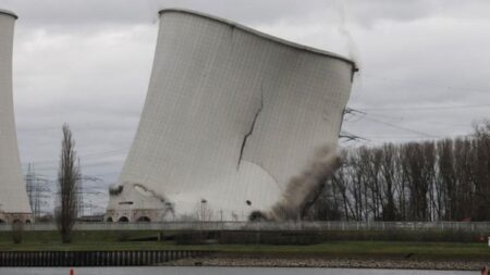 See a huge nuclear cooling tower come crashing down in planned implosion – USA Today